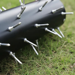 Virdena manual rolling lawn core aerator with 20-inch frame, 2.4-inch steel spikes, and T-handle for yard and garden aeration.