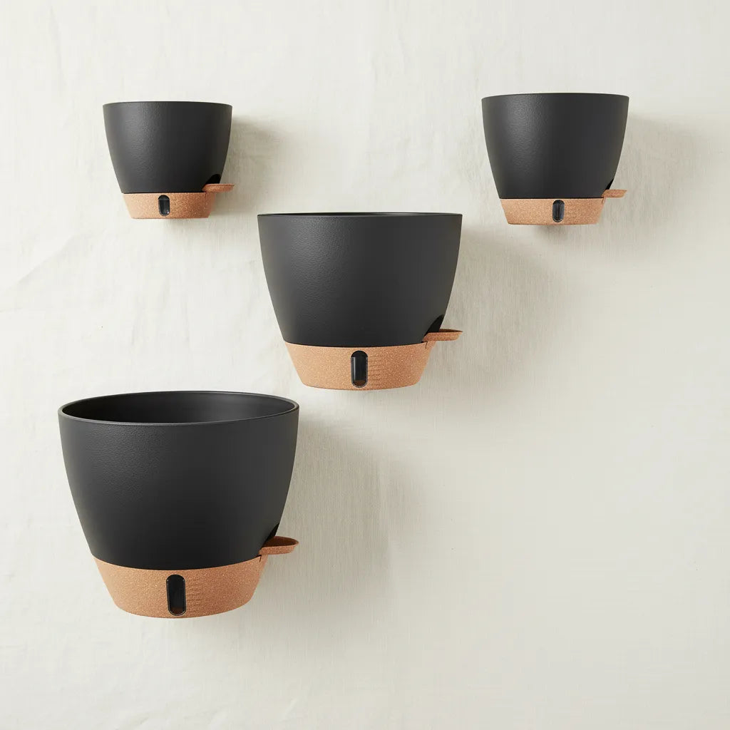 Virdena self-watering indoor and outdoor plant pot in black, available in 8, 9, 10, and 12 inches with drainage tray.